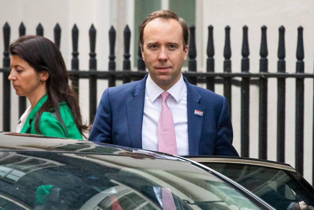 Matt Hancock said he had "let people down" and was "very sorry" for breaking social distancing rules, after pictures emerged of him kissing his closest aide Gina Coladangelo. (Photo by Dan Kitwood/Getty Images)