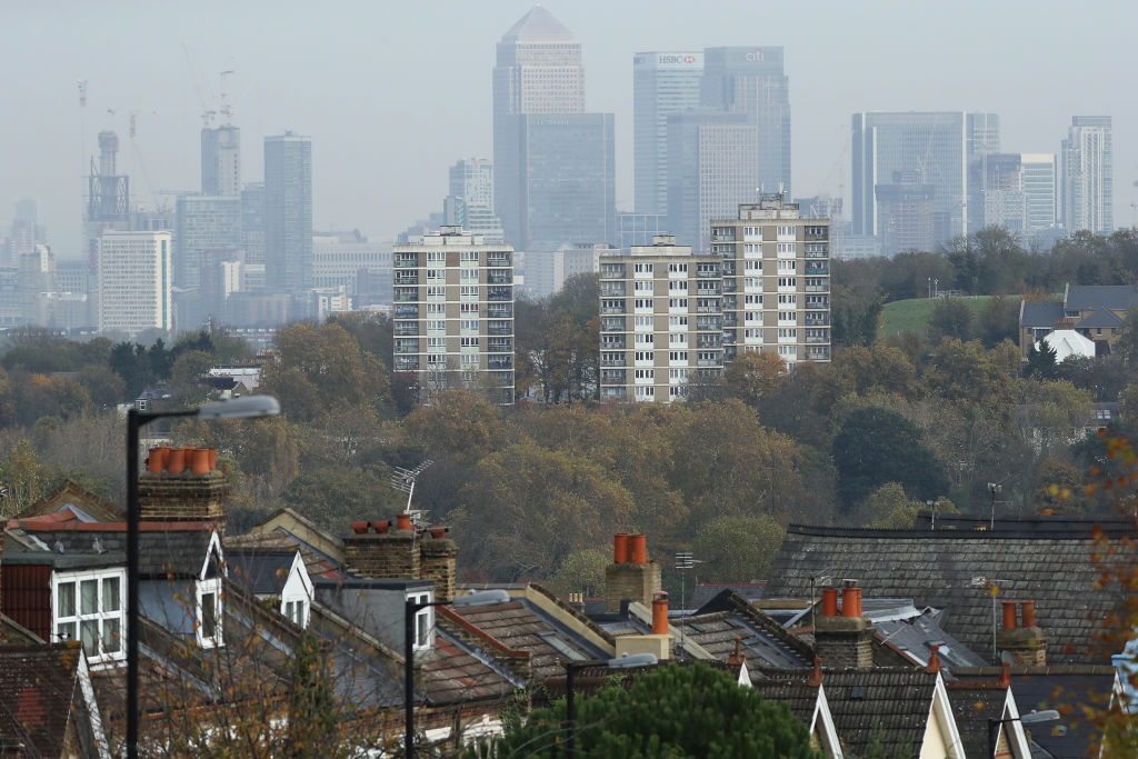 LONDON, ENGLAND - NOVEMBER 01:  A general view over the City of London towering over residential and social housing on November 1, 2017 in London, England. Ahead of an expected interest rate rise, the ratings agency, Moody's has suggested that property prices would not be greatly affected as the market remains resilient.  (Photo by Dan Kitwood/Getty Images)