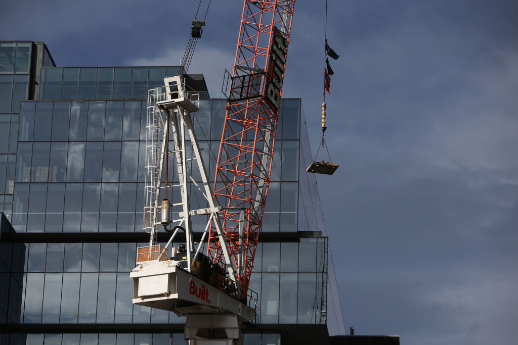 SYDNEY, AUSTRALIA - JULY 28: A crane is seen at a quiet construction site in the central business district of Parramatta on July 28, 2021 in Sydney, Australia. Lockdown restrictions for Greater Sydney have been extended by four weeks, to August 28th as the city struggles to contain the highly contagious Covid-19 delta variant. (Photo by Lisa Maree Williams/Getty Images)