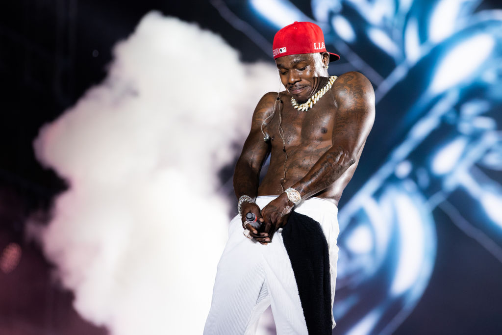 DaBaby performs on stage during Rolling Loud at Hard Rock Stadium in Miami Gardens, Florida. He asked fans to light their phones up if they didn't have HIV/AIDS (Photo by Rich Fury/Getty Images)