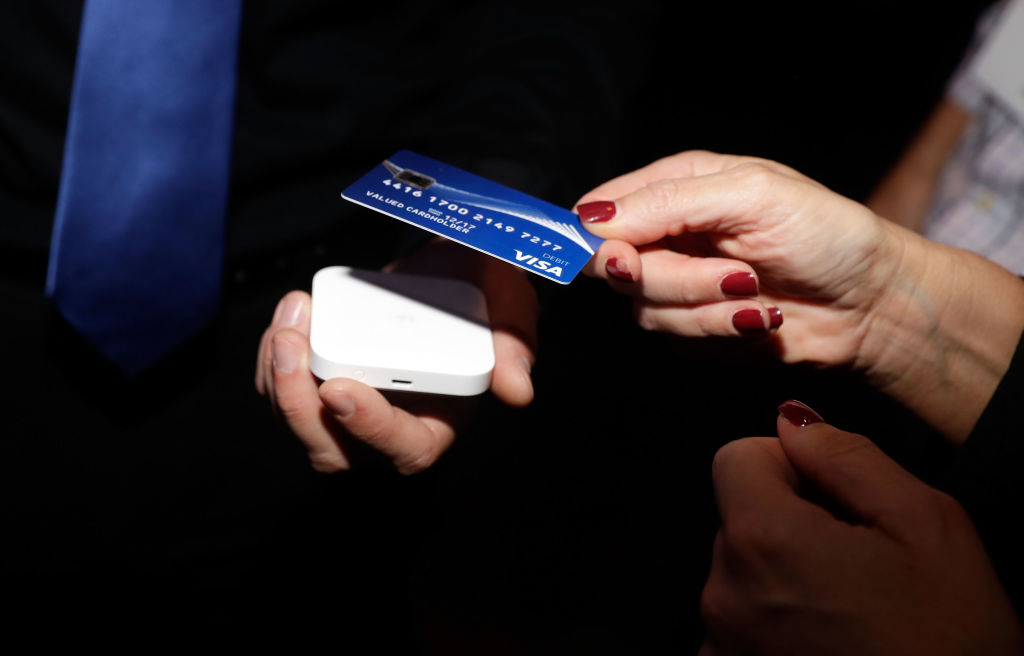 LAS VEGAS, NV - OCTOBER 23:  Guests tap to pay using contactless cards to support releif efforts during the Visa ID Intelligence launch party at Money 20/20 on October 23, 2017 in Las Vegas, Nevada.  (Photo by Isaac Brekken/Getty Images for VISA Inc)