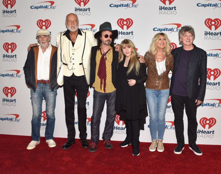 Hipgnosis owns the rights to thousands of high-profile artists.: (L-R) John McVie, Mick Fleetwood, Mike Campbell, Stevie Nicks, Christine McVie, and Neil Finn of Fleetwood Mac. Hipgnosis has purchased songs from 2 of the principal members of Fleetwood Mac. (Photo by David Becker/Getty Images for iHeartMedia)