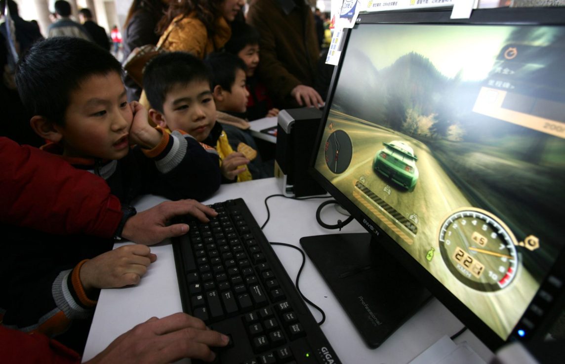 The Chinese government limits under-18s to play online games for three hours per week to curb video game addiction.(Photo by China Photos/Getty Images)