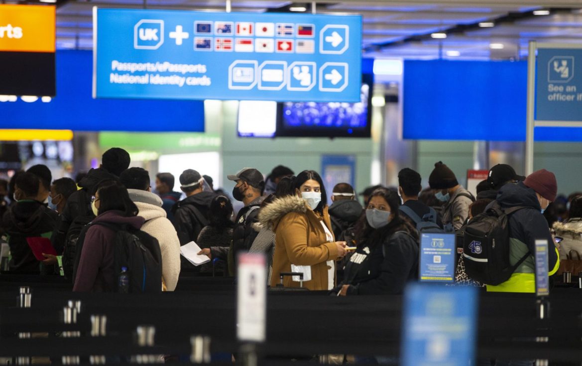 People queue at UK border control at Terminal 2 at Heathrow Airport (Getty Images)