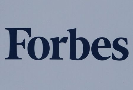 FILE PHOTO: The logo of Forbes magazine is seen on a board in 2017