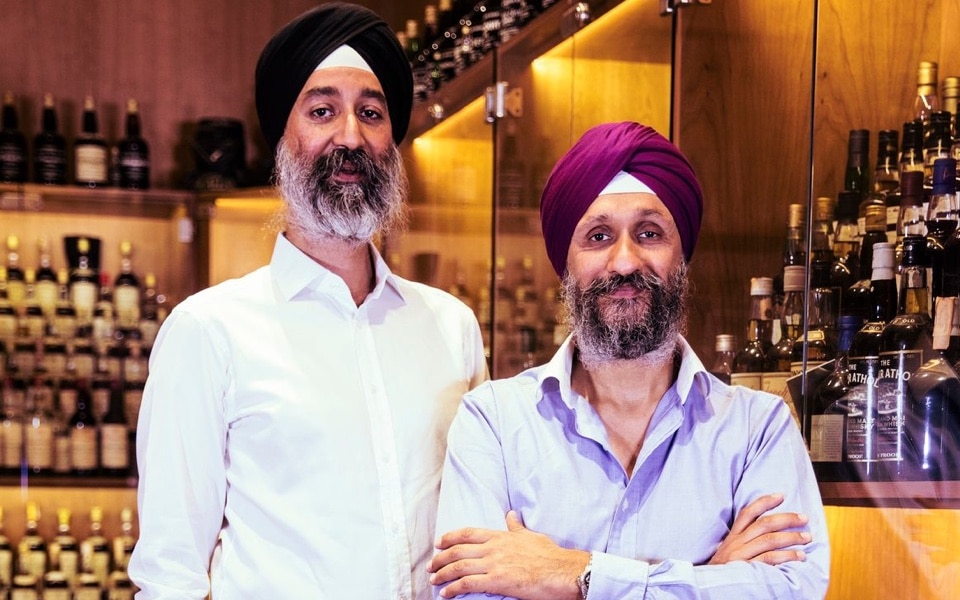 Sukhinder Singh (right), founder of The Whisky Exchange, with his brother and co-founder Rajbir