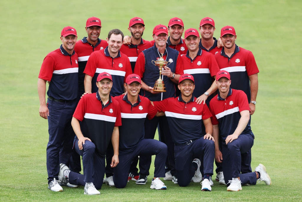 The victorious US Ryder Cup squad with the trophy after their 19-9 win
