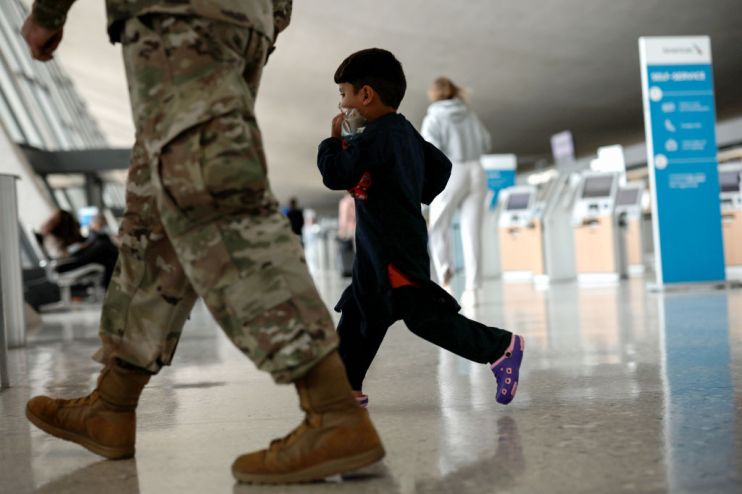 Afghan Refugees Arrive At Dulles Airport After US Pulls Out Final Troops