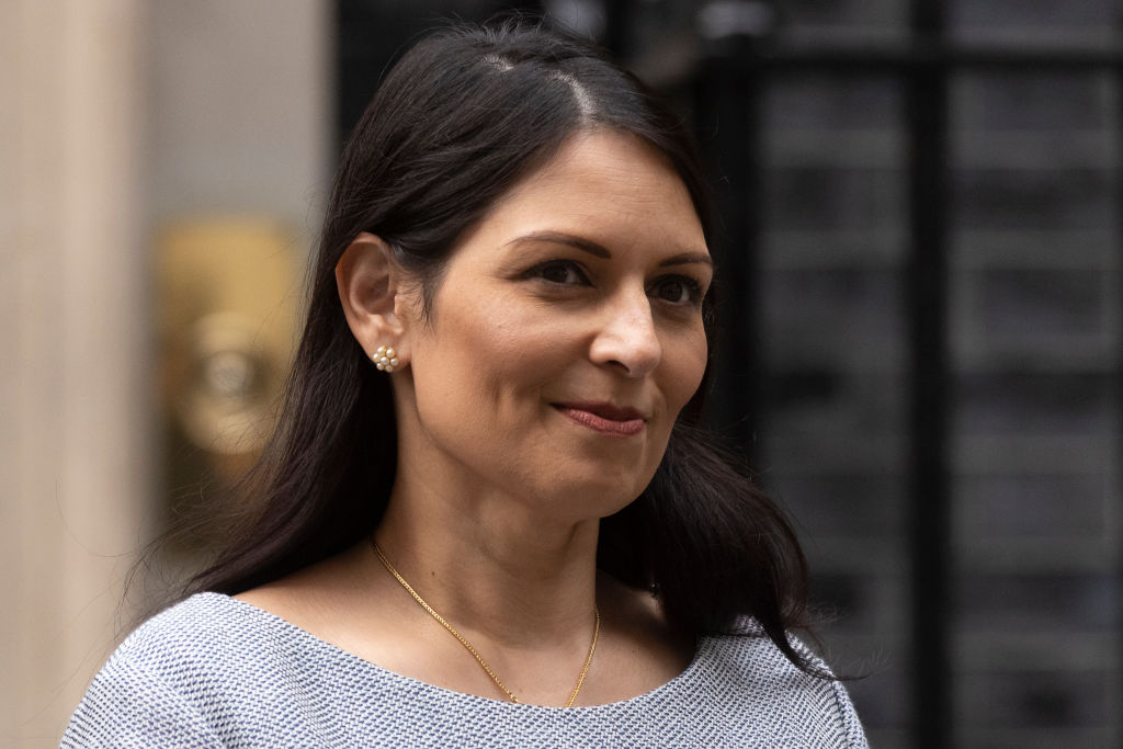 Priti Patel aims to prevent Facebook from rolling out end-to-end encryption across its platforms. She is concerned that encryption could be used as a shelter behind which pedofiles can hide online. (Photo by Dan Kitwood/Getty Images)