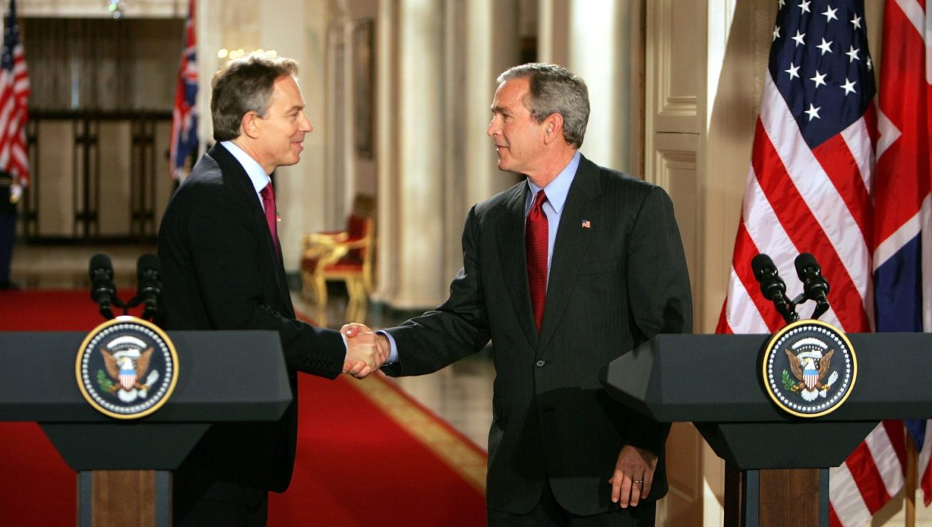 WASHINGTON - NOVEMBER 12:  U.S. President George W. Bush (R) and British Prime Minister Tony Blair shake hands during a news conerence in the East Room of the White House November 12, 2004 in Washington DC. This is the first meeting between Blair and the President since Bush was re-elected.  (Photo by Joe Raedle/Getty Images)