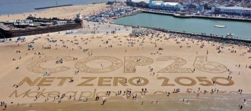 Artwork on sand highlights climate change ahead of COP26