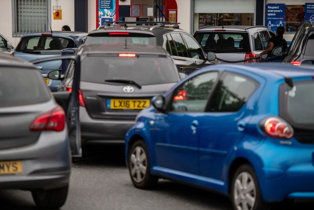 Queues of cars outside fuel stations were seen across the UK for most of the weekend (Photo by Chris J Ratcliffe/Getty Images)