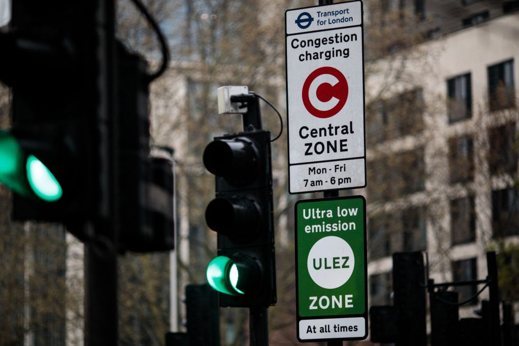 LONDON, ENGLAND - APRIL 08: A green sign demarcates London's Ultra Low Emissions Zone (ULEZ) as the charge comes in to effect today on April 8, 2019 in London, England. In a bid by Transport for London to improve air quality, older and more polluting cars will be charged £12.50 to enter the ULEZ area and congestion zone. (Photo by Jack Taylor/Getty Images)