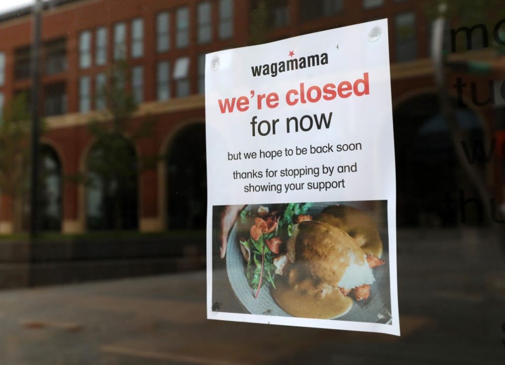 AYLESBURY, ENGLAND - MAY 11: A closed sign in the window of Wagamama on May 11, 2020 in Aylesbury, England. The prime minister announced the general contours of a phased exit from the current lockdown, adopted nearly two months ago in an effort curb the spread of Covid-19. (Photo by Catherine Ivill/Getty Images)
