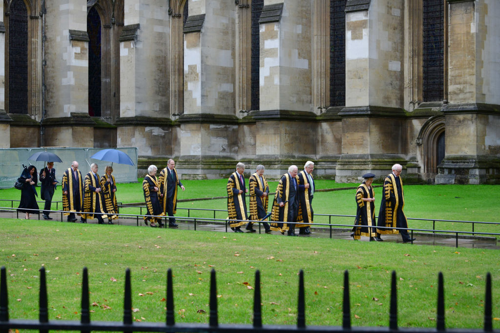 LONDON, ENGLAND - OCTOBER 1:  All eleven Supreme Court Judges led by Lady Hale (along with Lord Sales, Lady Arden, Lady Black, Lord Kerr, Lord Hodge, Lord Kitchin, Lord Lloyd-Jones, Lord Carnwath, Lord Wilson and Lord Reed), walk through the grounds of Westminster Abbey, to take part in the annual Abbey judges service (to mark the start of the legal year), October 1st 2019, London, England, UK.(Photo by Jeff Overs/BBC News & Current Affairs via Getty Images)