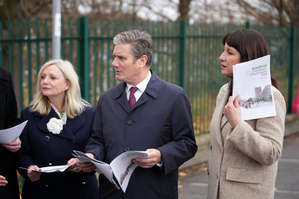 BRADFORD, ENGLAND - NOVEMBER 18: Labour leader Sir Keir Starmer (C), shadow chancellor Rachel Reeves and Metro Mayor Tracy Brabin (L) visit Bradford Wholesale markets, the proposed site for a Northern Powerhouse Rail station on November 18, 2021 in Bradford, England. The Labour Party leader was critical of the government's Integrated Rail plan, which revises or scraps prior proposals for new rail infrastructure in the north of England. (Photo by Christopher Furlong/Getty Images)