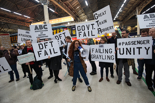 LONDON, ENGLAND - DECEMBER 15: Demonstrators stage a protest at Victoria Station against Southern Rail and its parent company Govia Thameslink Railway on December 15, 2016 in London, England. Talks held at ACAS between Southern Rail and the Aslef union over driver-only trains ended without agreement today. Commuters are set to face another day of strike action by Southern Rail tomorrow. (Photo by Jack Taylor/Getty Images)