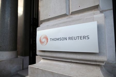 FILE PHOTO: The logo of Thomson Reuters is pictured at the entrance of its Paris headquarters, France