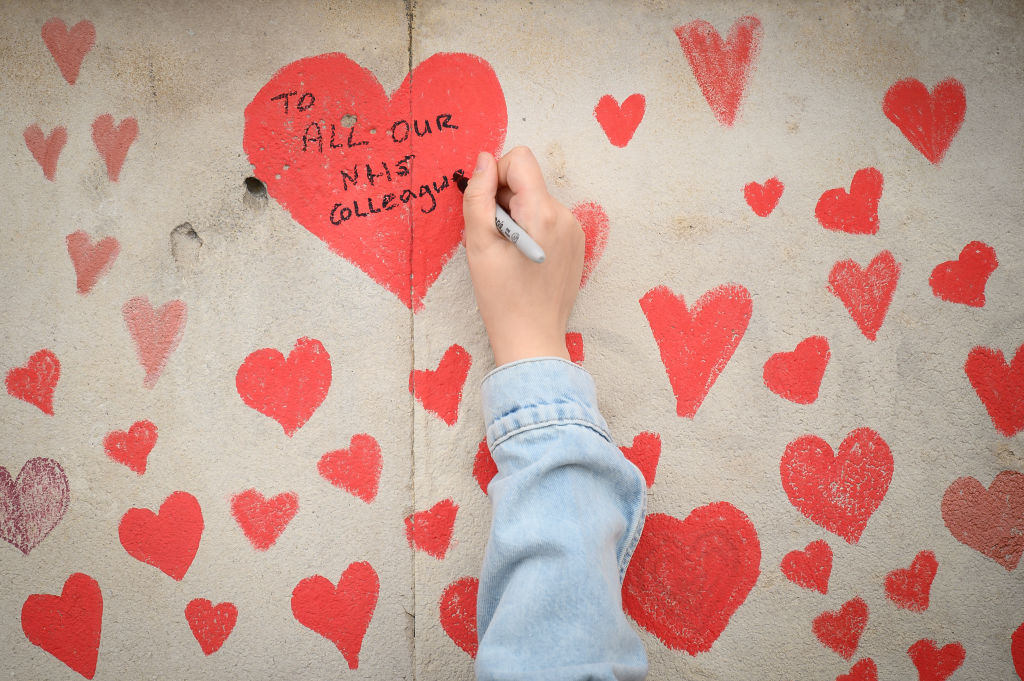 Hearts Are Added To The Covid-19 Memorial Wall In Central London