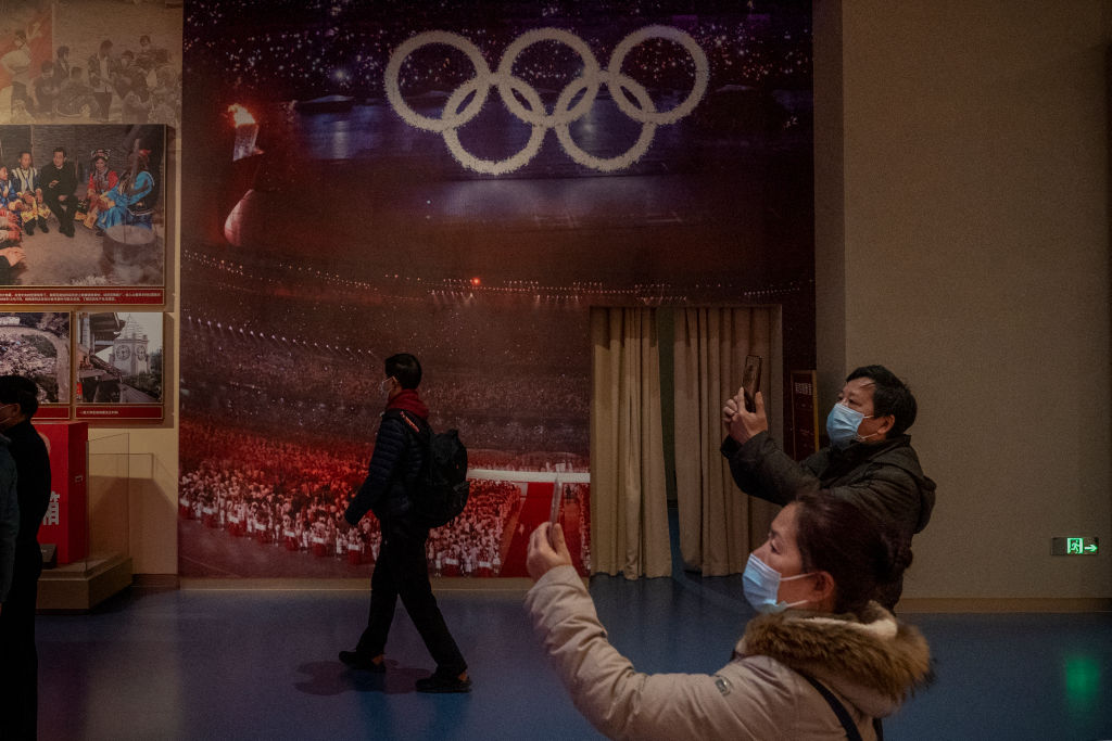 BEIJING, CHINA - DECEMBER 16: People visit the section of the museum dedicated to the Beijing 2008 Olympics on December 16, 2021 at the Museum of the Communist Party of China in Beijing, China. (Photo by Andrea Verdelli/Getty Images)