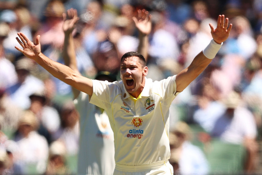 Scott Boland took six wickets as Australia dominated in Melbourne to win the Ashes.