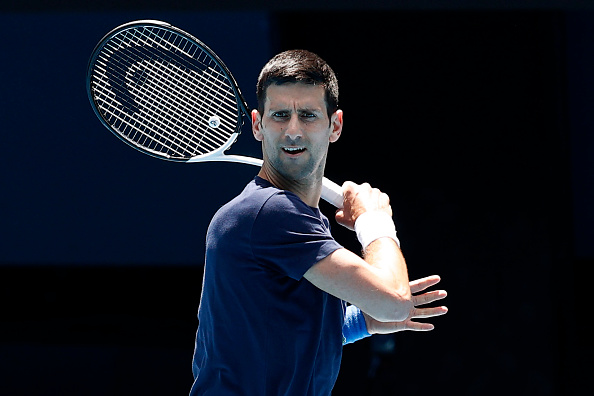 Djokovic hopes to defend his Australian Open title next week despite a fresh probe into his Covid-19 vaccination exemption and visa