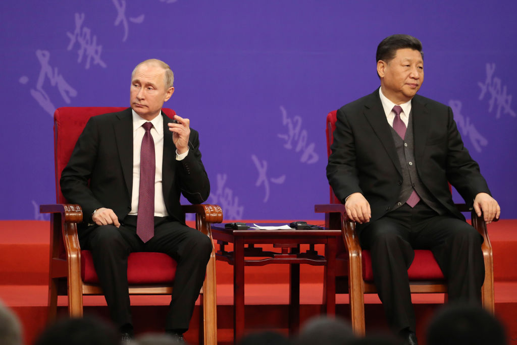 President Xi and President Putin have pledged to work closely. (Photo by Kenzaburo Fukuhara - Pool/Getty Images)