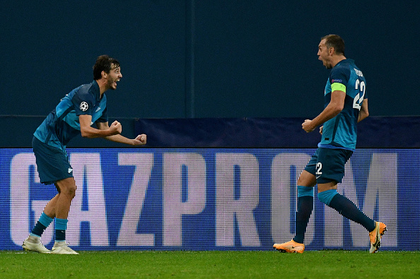 SAINT PETERSBURG, RUSSIA - NOVEMBER 04: Aleksandr Erokhin of Zenit St. Petersburg celebrates the opening goal with his team-mates during the UEFA Champions League Group F stage match between Zenit St. Petersburg and SS Lazio at Gazprom Arena on November 04, 2020 in Saint Petersburg, Russia. (Photo by Marco Rosi - SS Lazio/Getty Images)