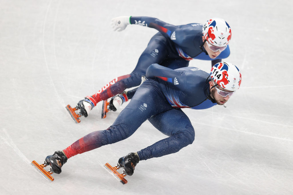 BEIJING, CHINA - FEBRUARY 01: Farrell Treacy and Niall Treacy of Team Great Britain skate during a short track speed skating practice session ahead of the Beijing 2022 Winter Olympic Games at Capital Indoor Stadium on February 01, 2022 in Beijing, China.  (Photo by Catherine Ivill/Getty Images)