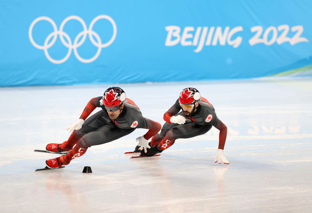 BEIJING, CHINA - FEBRUARY 01: Maxime Laoun and Steven Dubois of Team Canada skate during a short track speed skating practice session ahead of the Beijing 2022 Winter Olympic Games at Capital Indoor Stadium on February 01, 2022 in Beijing, China. (Photo by Catherine Ivill/Getty Images)