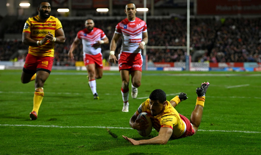 ST HELENS, ENGLAND - FEBRUARY 10: Fouad Yaha of Catalans scores the opening try during the Betfred Super League match between St Helens and Catalans Dragons at Totally Wicked Stadium on February 10, 2022 in St Helens, England. (Photo by Gareth Copley/Getty Images)
