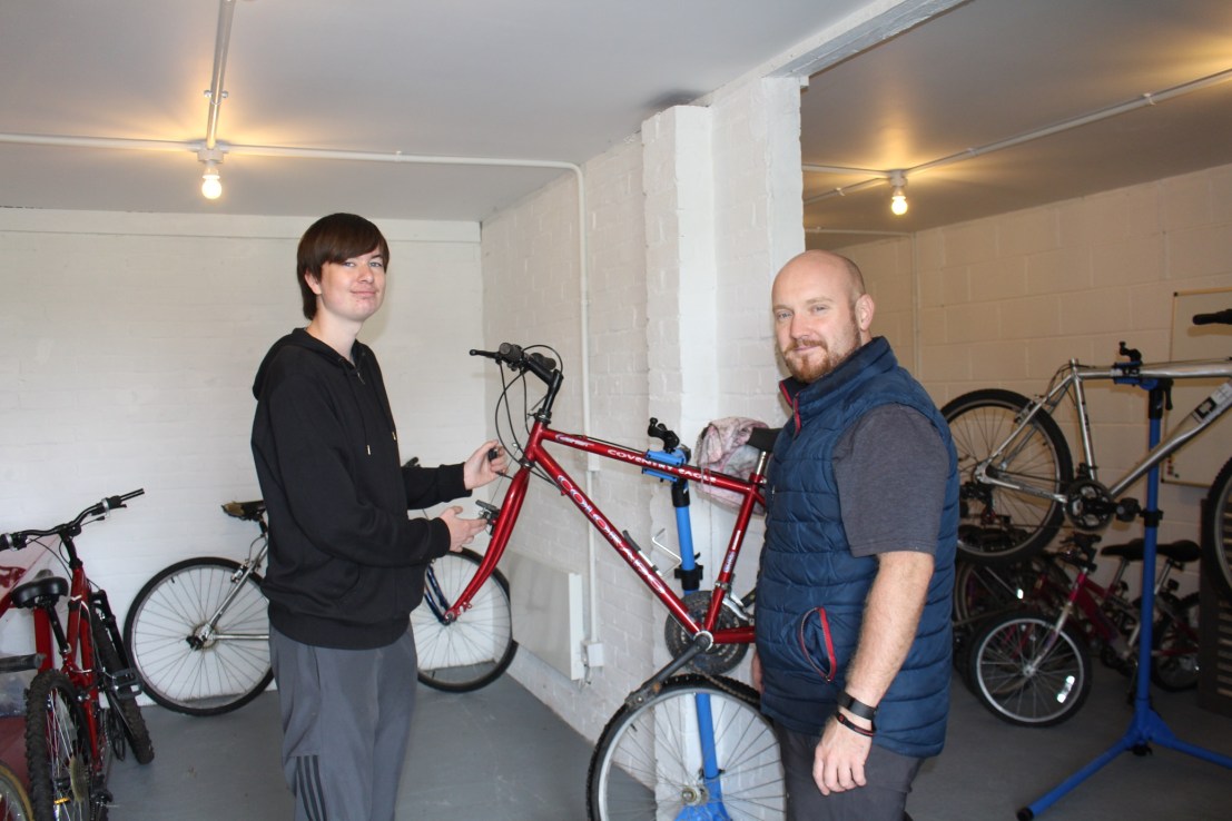 Tom Swaden at the Bromley Mencap bicycle maintenance training programme with trainer Steve O’Hara