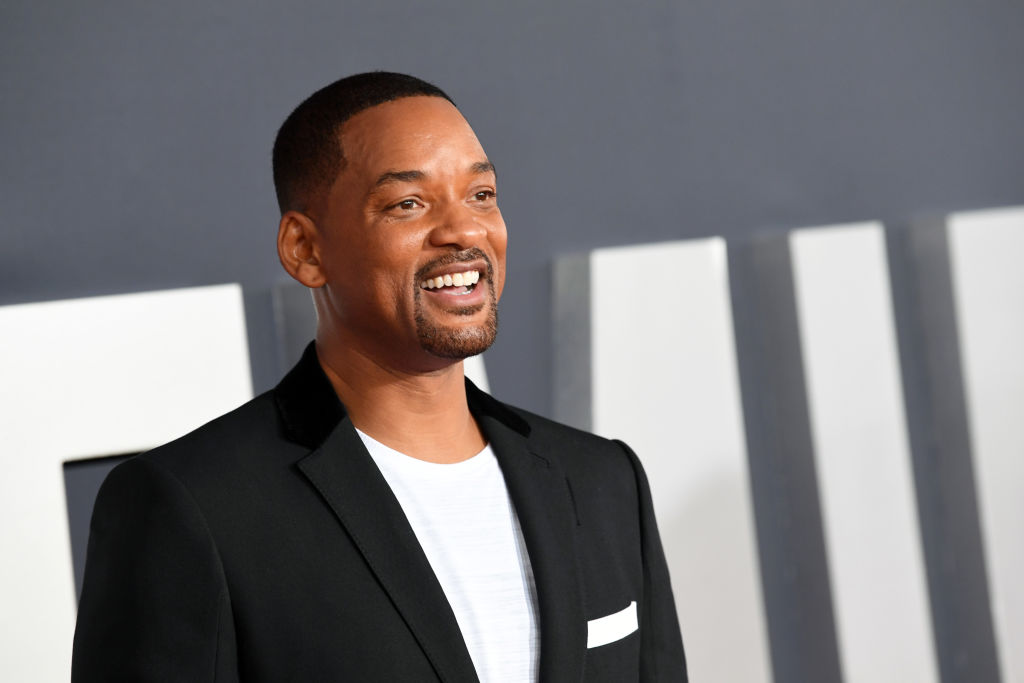 Will Smith punched Chris Rock live on stage for making a joke about his wife during the Oscars ceremony. (Photo by Kevin Winter/Getty Images)