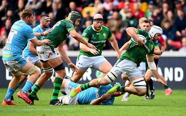 Rogerson (with ball) has led London Irish into contention for a Premiership play-off place for the first time in 13 years