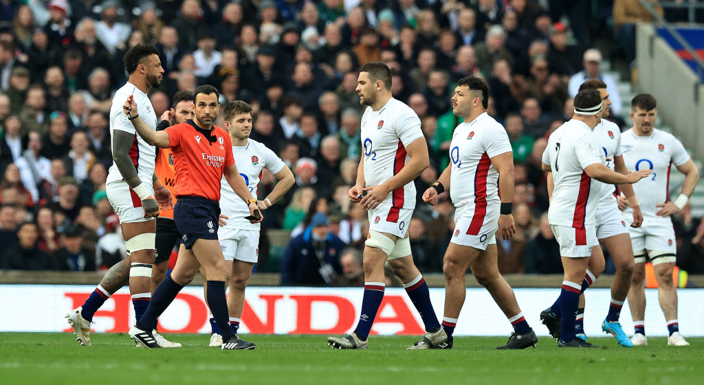 Charlie Ewels was sent off for England for an illegal tackle but his side put in a spirited performance in their loss to Ireland.
