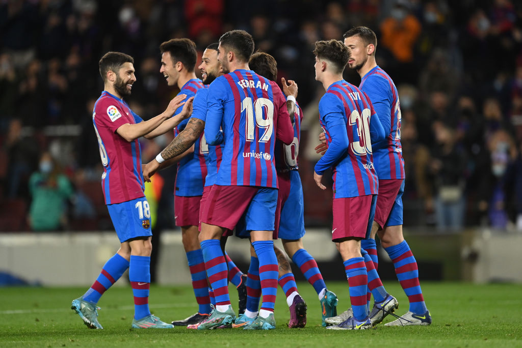 BARCELONA, SPAIN - MARCH 13: Riqui Puig of FC Barcelona celebrates with teammates after scoring their team's fourth goal during the LaLiga Santander match between FC Barcelona and CA Osasuna at Camp Nou on March 13, 2022 in Barcelona, Spain. (Photo by David Ramos/Getty Images)