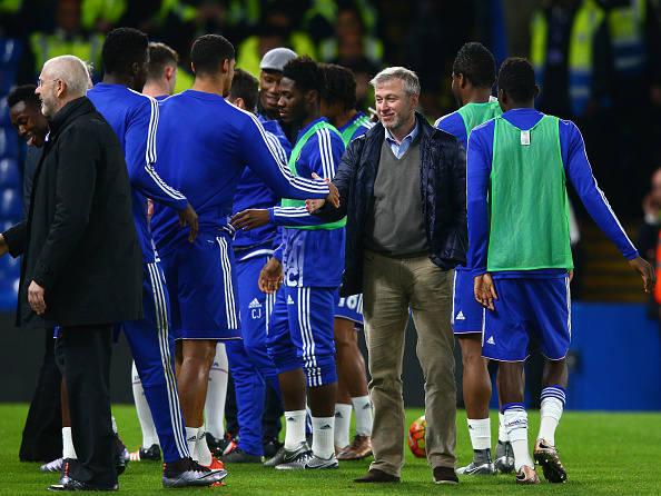 LONDON, ENGLAND - DECEMBER 19:  Chelsea owner Roman Abramovich (3rd R) congratulates players and staffs after their 3-1 win in the Barclays Premier League match between Chelsea and Sunderland at Stamford Bridge on December 19, 2015 in London, England.  (Photo by Clive Mason/Getty Images)