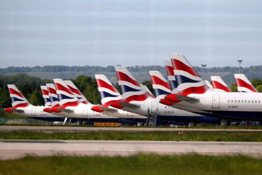 GATWICK, UNITED KINGDOM - MAY 05:  British Airways planes are seen parked up after being grounded due to the coronavirus outbreak on May 05, 2020 in Gatwick, United Kingdom. The country continued quarantine measures intended to curb the spread of Covid-19, but the infection rate is falling, and government officials are discussing the terms under which it would ease the lockdown. (Photo by Bryn Lennon/Getty Images)