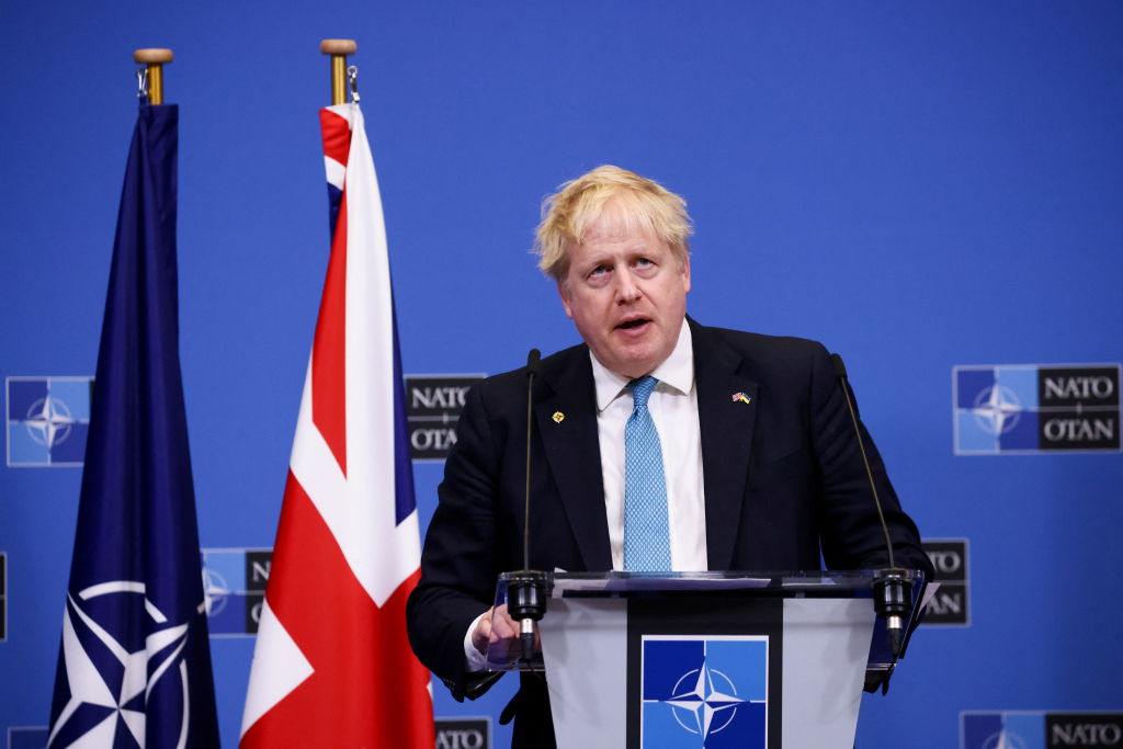 BRUSSELS, BELGIUM - MARCH 24: Britain's Prime Minister Boris Johnson addresses the media during a press conference following a NATO summit on Russia's invasion of Ukraine, at the alliance's headquarters in Brussels, on March 24, 2022 in Brussels, Belgium. Heads of State and Government take part in the North Atlantic Council (NAC) Summit. They will discuss the consequences of President Putin's invasion of Ukraine and the role of China in the crisis. Then decide on the next steps to strengthen NATO's deterrence and defence. (Photo Henry Nicholls - Pool/Getty Images)