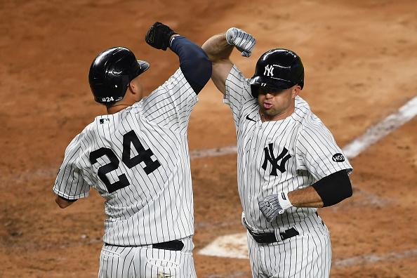 NEW YORK, NEW YORK - SEPTEMBER 17: Brett Gardner #11 celebrates with Gary Sanchez #24 of the New York Yankees after Gardner hit a two-run home run during the fourth inning against the Toronto Blue Jays at Yankee Stadium on September 17, 2020 in the Bronx borough of New York City. (Photo by Sarah Stier/Getty Images)