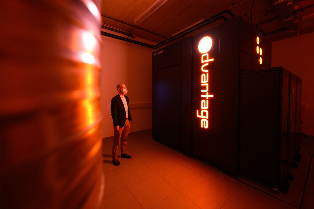 An employer of Forschungszentrum Jülich stands next to the D-Wave Systems Advantage quantum computer, the first such system with a processor architecture of over 5,000 qubits to go into operation outside North America. (Photo by Lukas Schulze/Getty Images)