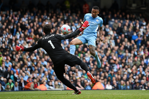 Gabriel Jesus put Manchester City ahead at half-time but Liverpool claimed a draw to keep the Premier League title race alive