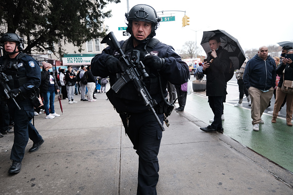 NEW YORK, NEW YORK - APRIL 12: Police and emergency responders gather at the site of a reported shooting of multiple people outside of the 36 St subway station on April 12, 2022 in the Brooklyn borough of New York City. According to authorities, multiple people have reportedly been shot and several undetonated devices were discovered at the 36th Street and Fourth Avenue station in the Sunset Park neighborhood.  (Photo by Spencer Platt/Getty Images)