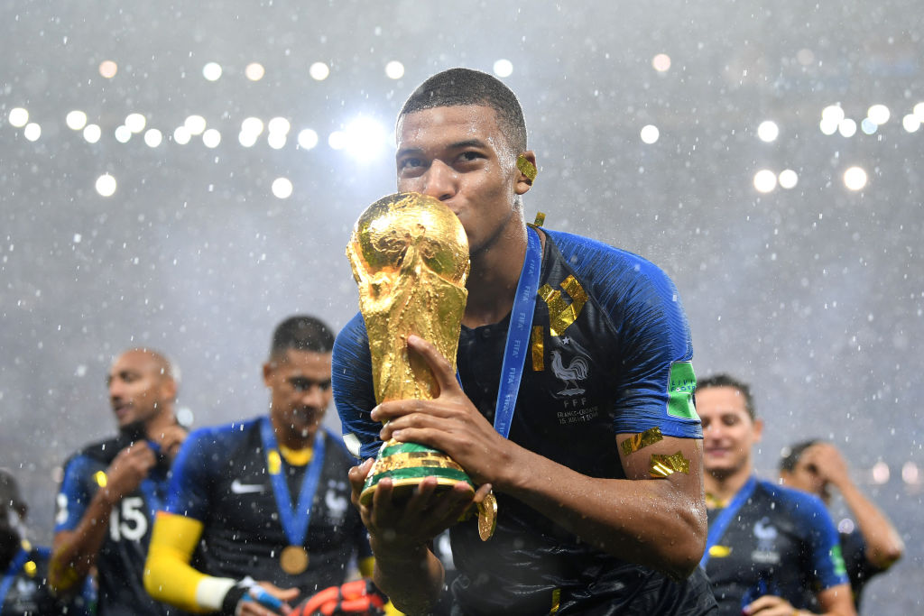 MOSCOW, RUSSIA - JULY 15:  Kylian Mbappe of France celebrates with the World Cup trophy following the 2018 FIFA World Cup Final between France and Croatia at Luzhniki Stadium on July 15, 2018 in Moscow, Russia.  (Photo by Matthias Hangst/Getty Images)