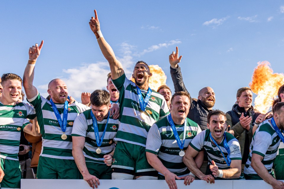 Ealing Trailfinders players celebrate winning the Rugby Championship after the Greene King IPA Championship match between Ealing Trailfinders and Richmond at Castle Bar , West Ealing , England. They have so far been denied promotion on the basis they do not meet the criteria necessary. Premiership Rugby chairman Martyn Phillips insists standards must remain high.