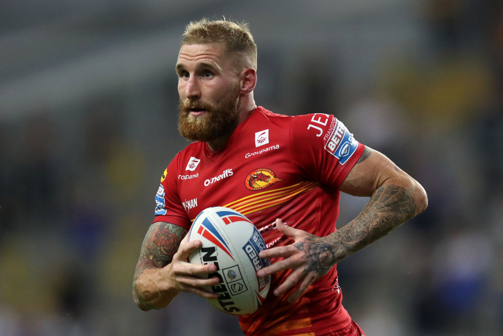 LEEDS, ENGLAND - JULY 09: Sam Tomkins of Catalans Dragons carries the ball during the Betfred Super League match between Leeds Rhinos and Catalans Dragons at Emerald Headingley Stadium on July 09, 2021 in Leeds, England. (Photo by George Wood/Getty Images)