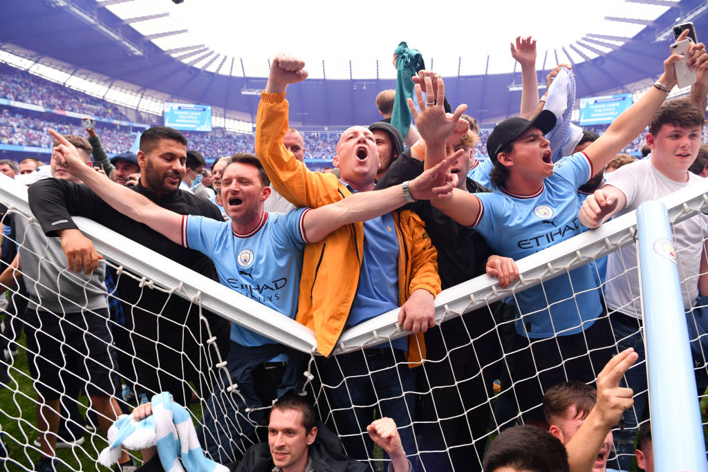 Thousands of Manchester City supporters invaded the pitch after they beat Aston Villa to secure the Premier League title