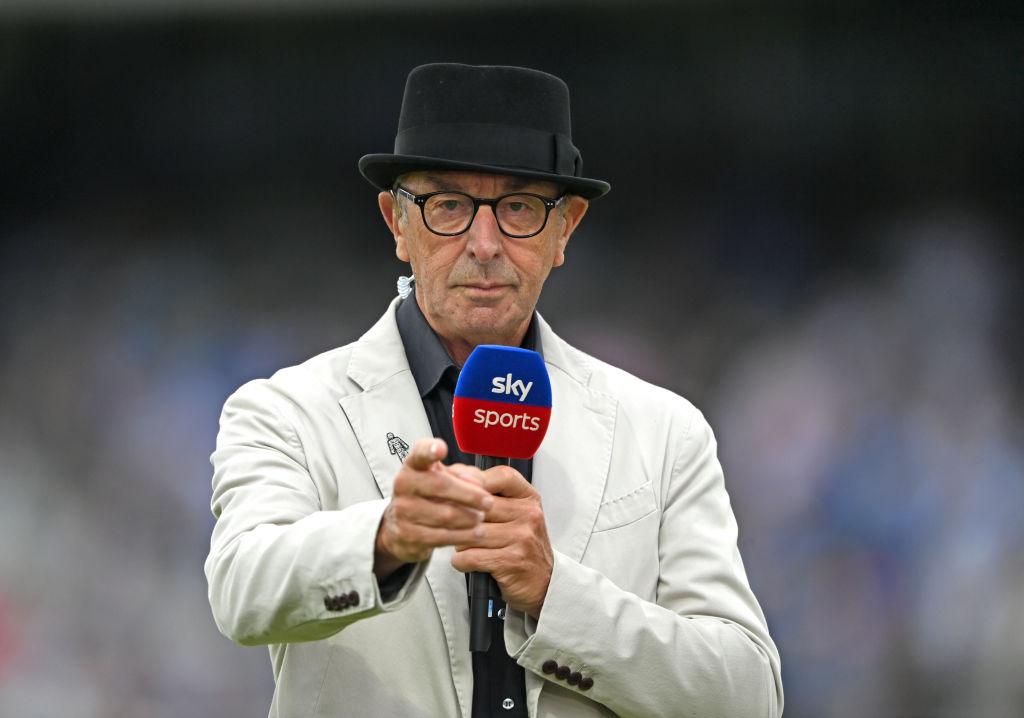 LONDON, ENGLAND - AUGUST 12: Sky Sports commentator David 'Bumble' Lloyd wearing a black hat during day one of the Second Test Match between England and India at Lord's Cricket Ground on August 12, 2021 in London, England. (Photo by Stu Forster/Getty Images)