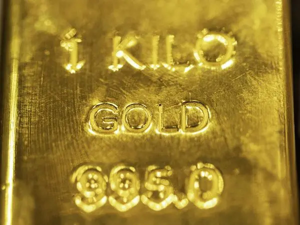 Gold prices touched record highs in a number of currencies as turmoil in the banking sector shook equity markets