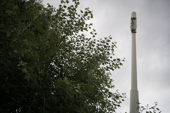 READING, ENGLAND - JULY 14: A mobile phone telecommunications mast is seen on July 14, 2020 in Reading, England. The British government announced that UK telecommunications companies would be banned from buying Huawei 5G after 31 December this year. Existing Huawei 5G equipment will need to be removed from their networks by 2027. (Photo by Leon Neal/Getty Images)